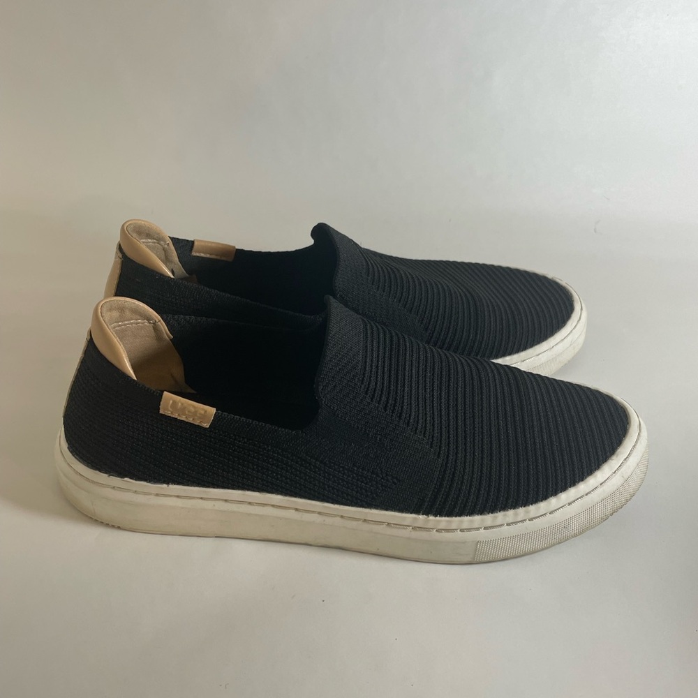 UGG Women’s Black Knit Slip-On Sneakers with Tan Heel Tabs